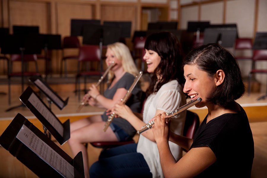 girls playing music instruments