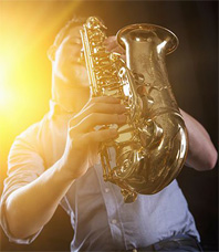 boy playing music instrument